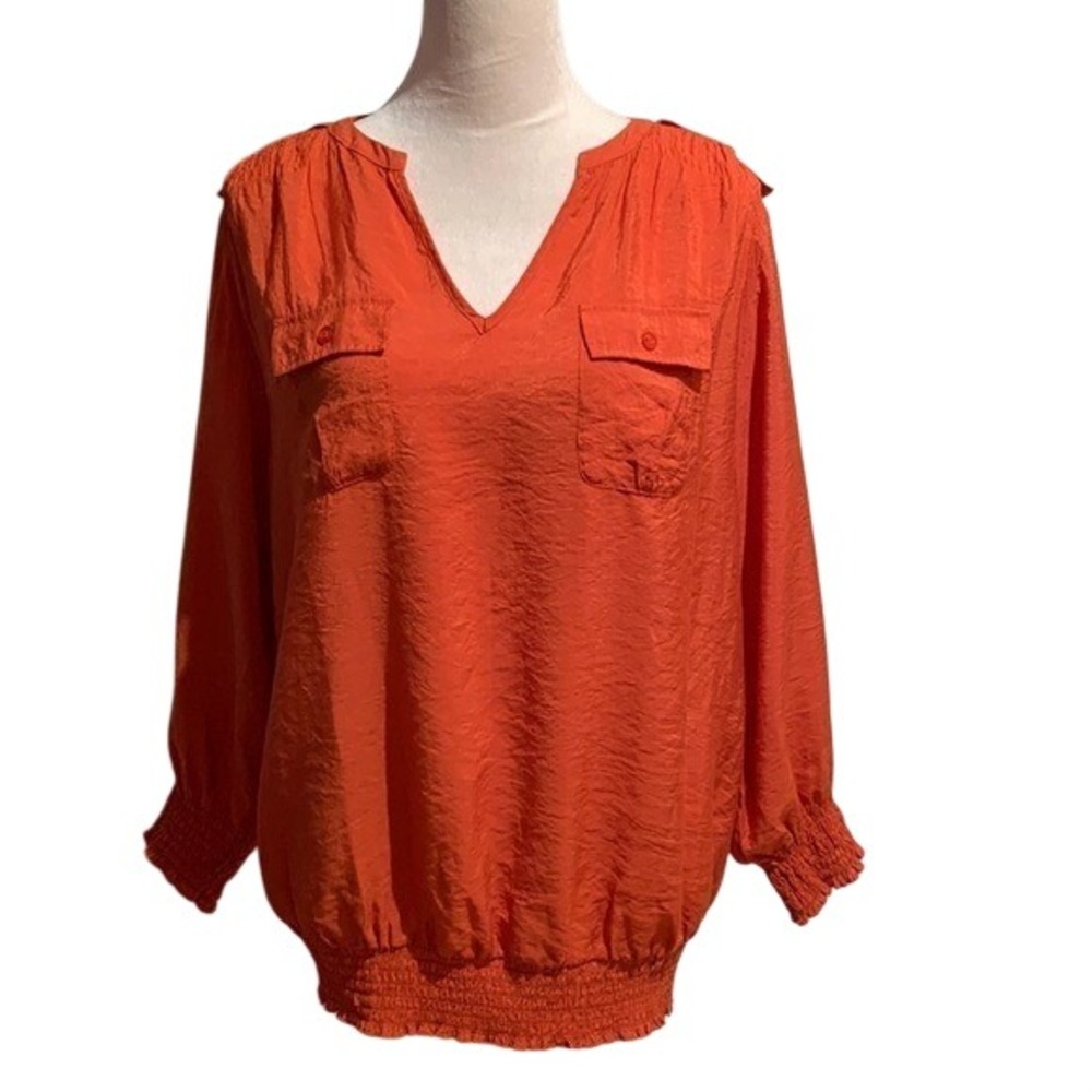 ASHLEY STEWART. 12W. Burnt Orange top,w/smock work‎ around neck, hem.